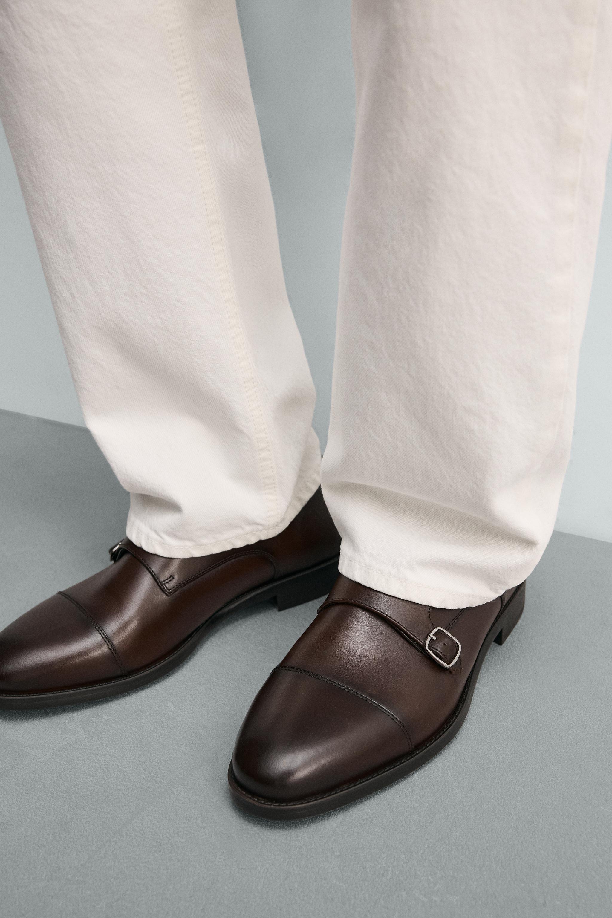 CHAUSSURES EN CUIR DOUBLE BOUCLE